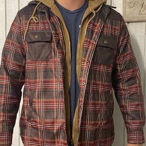 A Flannel zip up Jacket. Includes pockets and a hood with strings.